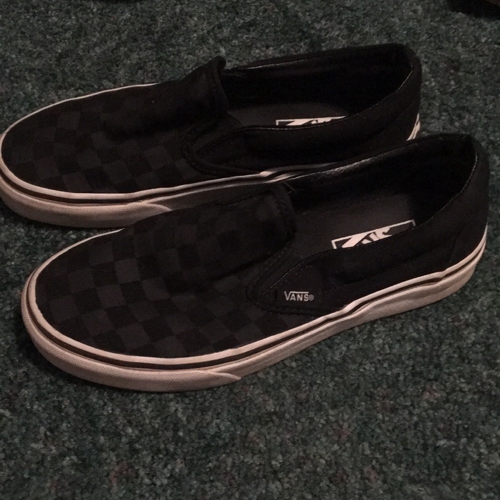 Women black checkered slip on Vans. Great condition size 6